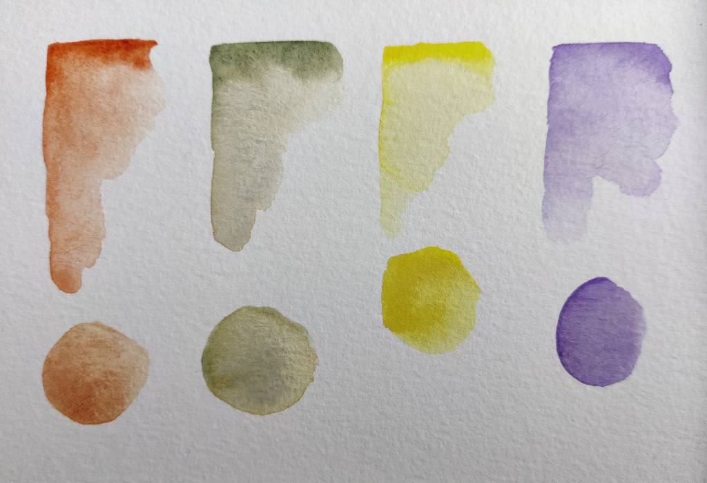 Quatre essais de couleur : orange, vert, jaune, violet